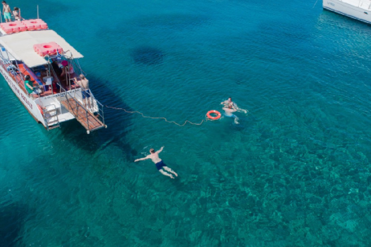 Chania: 4-Hour Boat Cruise to Theodorou Island with 3 Swim Stops & WWII Plane Wreck